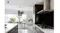 Side view of kitchen with cooktop, stainless steel rangehood, black splashback, cabinetry and dining area with garden view Side view of kitchen with cooktop, stainless steel rangehood, black splashback, cabinetry and dining area with garden view
