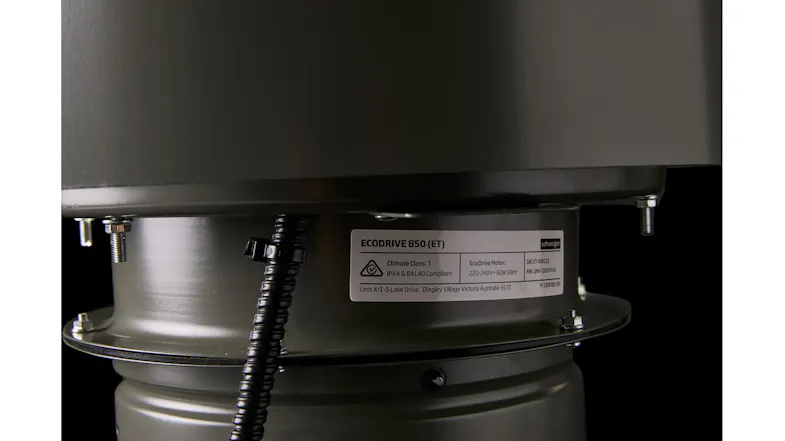 Lower section of a roof vent with wiring and a label reading “ECODRIVE 850,” mounted on a metal pipe Lower section of a roof vent with wiring and a label reading “ECODRIVE 850,” mounted on a metal pipe