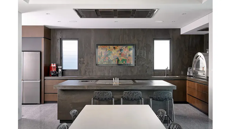 Modern kitchen with Schweigen INART ceiling cassette rangehood installed above the countertop, featuring minimalist design and stainless finish Modern kitchen with Schweigen INART ceiling cassette rangehood installed above the countertop, featuring minimalist design and stainless finish