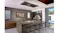 A luxury kitchen interior showcasing Schweigen 200cm ceiling cassette rangehood A luxury kitchen interior showcasing Schweigen 200cm ceiling cassette rangehood