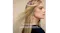 Side profile of long hair blowing outward to show movement and smoothness Side profile of long hair blowing outward to show movement and smoothness