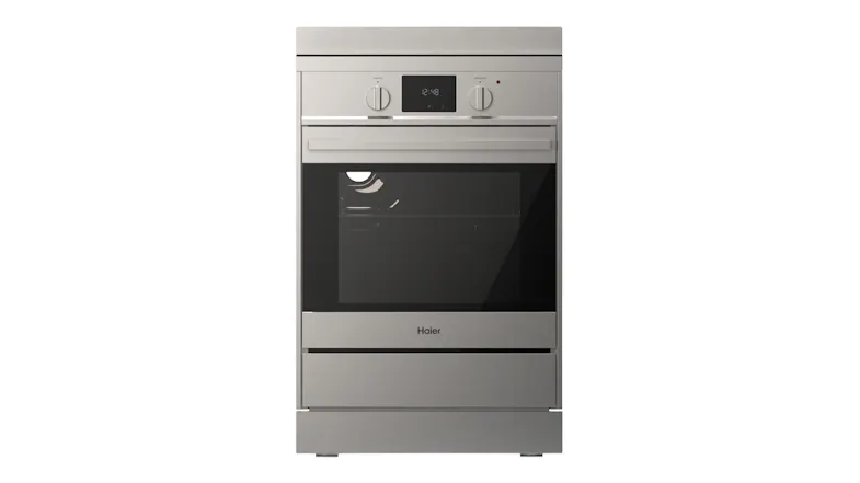 Front view of the Haier oven showing the dials and digital panel Front view of the Haier oven showing the dials and digital panel