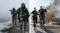 Split screen showing Ghost and an ally in a swamp, and two elite operatives on a European street Split screen showing Ghost and an ally in a swamp, and two elite operatives on a European street