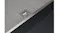 Close-up of rangehood mesh filter with metal pull tab and black panel edge Close-up of rangehood mesh filter with metal pull tab and black panel edge