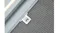 Close-up of a metal mesh filter panel with a small latch next to a slim illuminated light strip Close-up of a metal mesh filter panel with a small latch next to a slim illuminated light strip