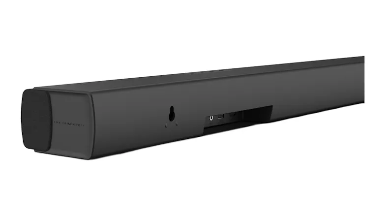 Rear view of a black soundbar showing ports and wall mount holes Rear view of a black soundbar showing ports and wall mount holes