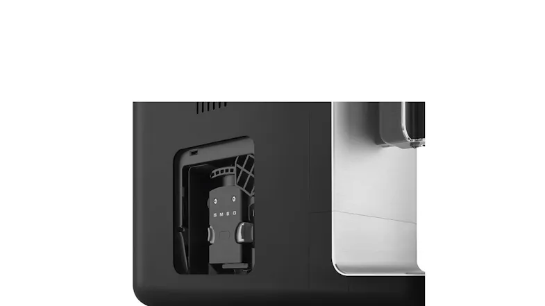 Side hatch view of the coffee machine showing the internal brewing mechanism Side hatch view of the coffee machine showing the internal brewing mechanism