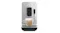 Front view of the Smeg unit featuring a cup filled with a layered coffee drink Front view of the Smeg unit featuring a cup filled with a layered coffee drink