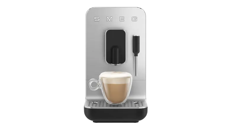 Front view of the Smeg unit featuring a cup filled with a layered coffee drink Front view of the Smeg unit featuring a cup filled with a layered coffee drink