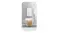 Front view of the Smeg unit featuring a cup filled with a layered coffee drink Front view of the Smeg unit featuring a cup filled with a layered coffee drink