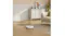 A bright living room showcasing the robot vacuum cleaning a rug A bright living room showcasing the robot vacuum cleaning a rug