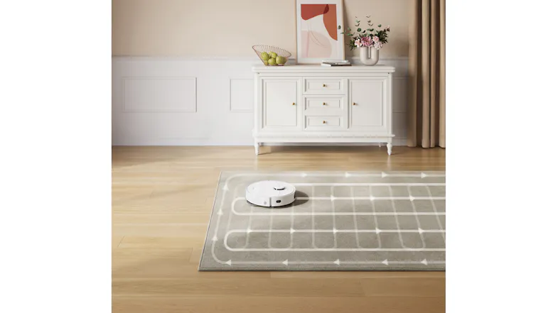 A beige area rug featuring the vacuum grid path overlay A beige area rug featuring the vacuum grid path overlay