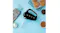 A kitchen counter showing cookies and a hand mixer A kitchen counter showing cookies and a hand mixer