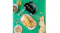 Smeg hand mixer with braided pesto bread and walnuts on a green surface Smeg hand mixer with braided pesto bread and walnuts on a green surface