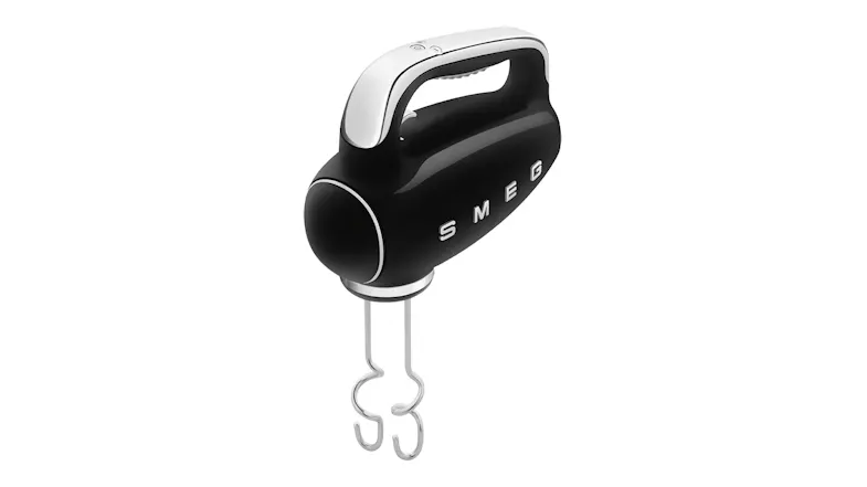 Perspective view of the Smeg hand mixer featuring dough hooks Perspective view of the Smeg hand mixer featuring dough hooks