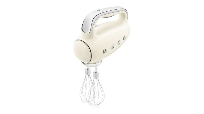 Perspective view of an electric hand mixer showcasing wire beaters Perspective view of an electric hand mixer showcasing wire beaters