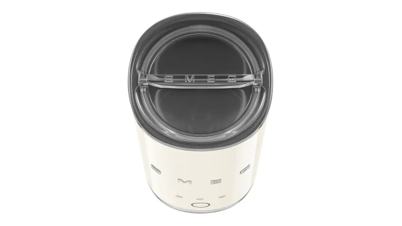 Top view with lid attached, showing a transparent insert and circular opening on the frother’s lid Top view with lid attached, showing a transparent insert and circular opening on the frother’s lid
