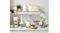 Kitchen countertop display featuring multiple cream Smeg appliances, including a stand mixer Kitchen countertop display featuring multiple cream Smeg appliances, including a stand mixer