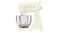Side view of the glossy cream Smeg 4.8L stand mixer with a stainless steel bowl attached Side view of the glossy cream Smeg 4.8L stand mixer with a stainless steel bowl attached