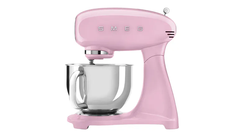 Side view of the glossy pink Smeg 4.8L stand mixer with a stainless steel bowl attached Side view of the glossy pink Smeg 4.8L stand mixer with a stainless steel bowl attached