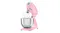Angled side view of the Smeg stand mixer with tilt head raised and whisk attachment over the stainless steel bowl Angled side view of the Smeg stand mixer with tilt head raised and whisk attachment over the stainless steel bowl