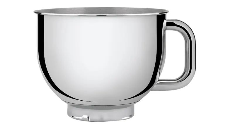 Close-up of a polished stainless steel mixing bowl with a curved handle, designed for the Smeg stand mixer Close-up of a polished stainless steel mixing bowl with a curved handle, designed for the Smeg stand mixer