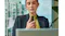 Front view of a person holding a remote control upright Front view of a person holding a remote control upright