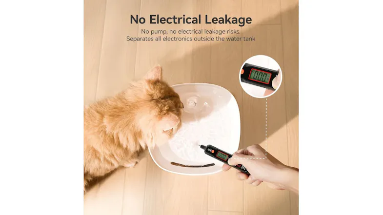 Cat drinking from the Cheerble fountain while the voltage tester shows zero reading, highlighting the safe no electrical leakage feature Cat drinking from the Cheerble fountain while the voltage tester shows zero reading, highlighting the safe no electrical leakage feature
