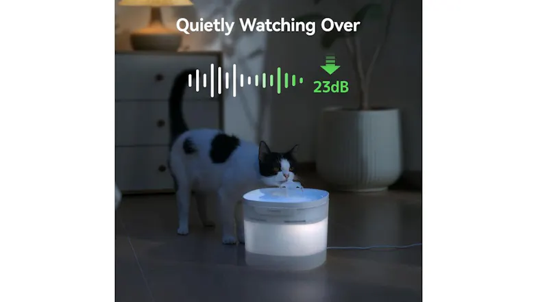 Cat drinking from a pet fountain at night with soft glow lighting, highlighting the ultra-quiet 23 dB low-noise operation feature Cat drinking from a pet fountain at night with soft glow lighting, highlighting the ultra-quiet 23 dB low-noise operation feature