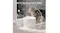 A cat beside a water fountain by a window, illustrating 24/7 continuous freshwater circulation with a clean, modern setup A cat beside a water fountain by a window, illustrating 24/7 continuous freshwater circulation with a clean, modern setup