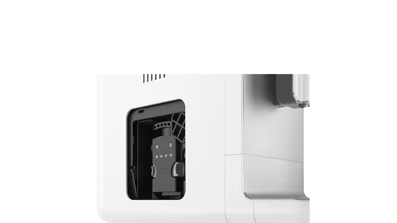 Side hatch view of the coffee machine showing the internal brewing mechanism Side hatch view of the coffee machine showing the internal brewing mechanism
