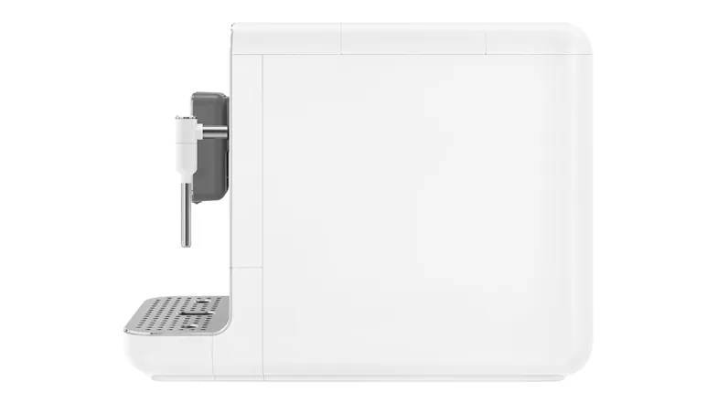 Left side view of the Smeg bean-to-cup coffee machine, highlighting the silver nozzle Left side view of the Smeg bean-to-cup coffee machine, highlighting the silver nozzle