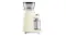 A side view of a sleek cream Smeg coffee grinder showing the grind size dial and a clear container with measurement markings A side view of a sleek cream Smeg coffee grinder showing the grind size dial and a clear container with measurement markings