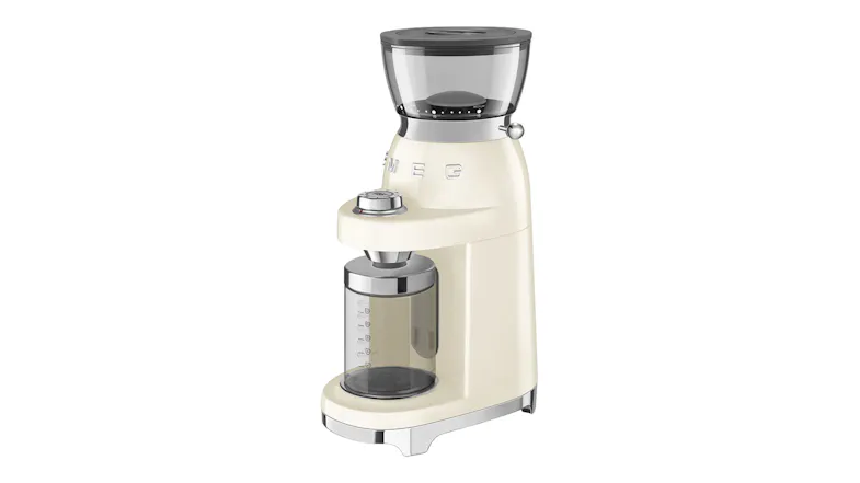 An angled view of the Smeg coffee grinder, highlighting the glossy black finish, silver trim, and transparent coffee chamber An angled view of the Smeg coffee grinder, highlighting the glossy black finish, silver trim, and transparent coffee chamber