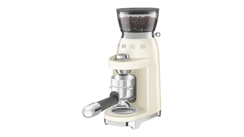 A Smeg coffee grinder with beans in the hopper and a portafilter attached, showcasing a premium retro-inspired design A Smeg coffee grinder with beans in the hopper and a portafilter attached, showcasing a premium retro-inspired design