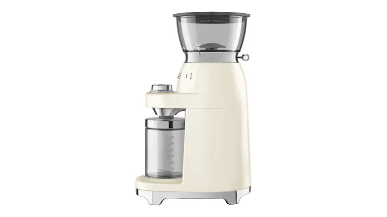Side profile of Smeg coffee grinder with transparent hopper and container, emphasising compact and elegant build Side profile of Smeg coffee grinder with transparent hopper and container, emphasising compact and elegant build
