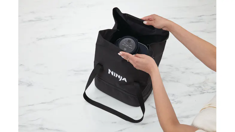 Top view of the tote bag featuring a Crispi unit inside Top view of the tote bag featuring a Crispi unit inside
