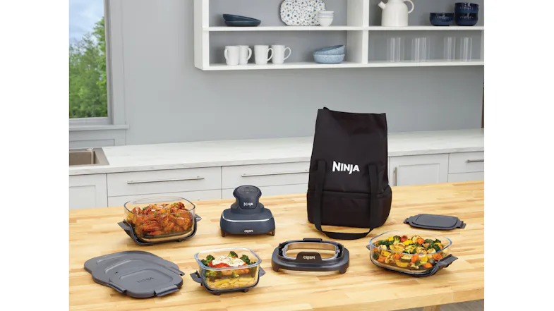 A modern kitchen setup featuring a Ninja tote bag with kitchenware A modern kitchen setup featuring a Ninja tote bag with kitchenware