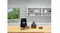 A wooden countertop showcasing the tote bag with an array of food containers A wooden countertop showcasing the tote bag with an array of food containers