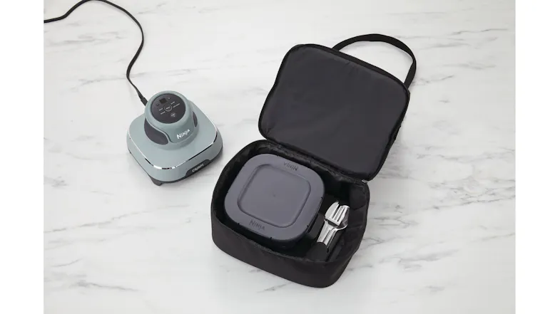 Top view of an open Ninja bag with glassware and utensils inside Top view of an open Ninja bag with glassware and utensils inside