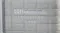 Close-up of Sealy Posturepedic Exquisite mattress side panel. Displays stitched grey fabric Close-up of Sealy Posturepedic Exquisite mattress side panel. Displays stitched grey fabric