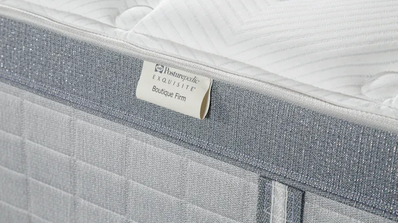 A close up view of the product's 'Boutique Firm' tag A close up view of the product's 'Boutique Firm' tag