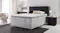 A view of the Exquisite Boutique Extra Firm Double Mattress displayed in a brightly-lit modern bedroom A view of the Exquisite Boutique Extra Firm Double Mattress displayed in a brightly-lit modern bedroom