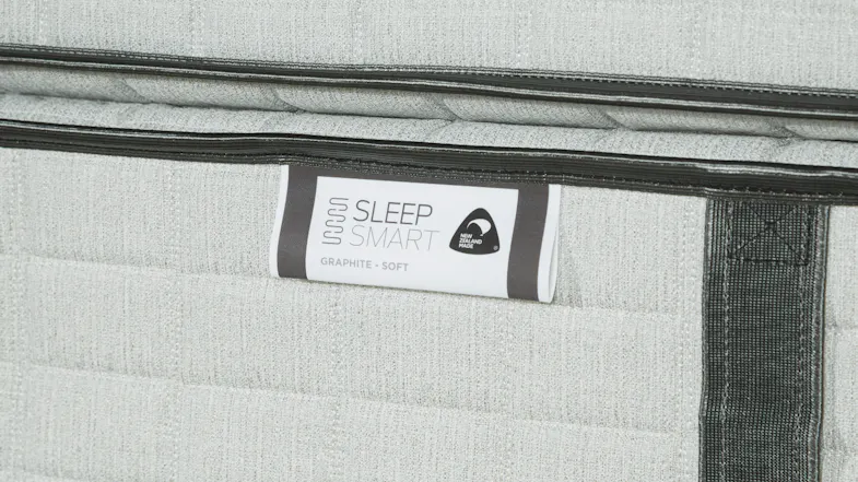 A label on a Sleep Smart Mattress identifying the model and indicating it is a "Soft" comfort level A label on a Sleep Smart Mattress identifying the model and indicating it is a "Soft" comfort level