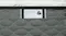 Close-up of “Sleep Smart Serene Extra Firm” label on grey patterned mattress fabric, marked “New Zealand Made.” Close-up of “Sleep Smart Serene Extra Firm” label on grey patterned mattress fabric, marked “New Zealand Made.”