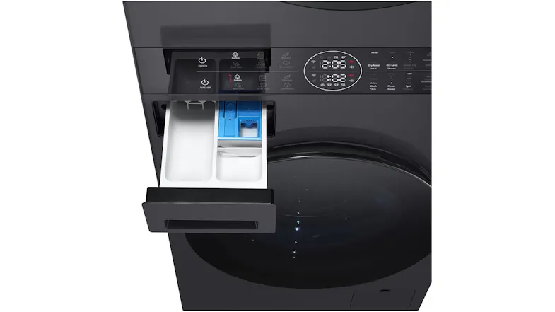 Top-down view of an open detergent drawer with a blue insert Top-down view of an open detergent drawer with a blue insert