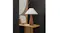 Angled room view showing the walnut lamp on a side table near wall décor, emphasising scale and ambient lighting Angled room view showing the walnut lamp on a side table near wall décor, emphasising scale and ambient lighting