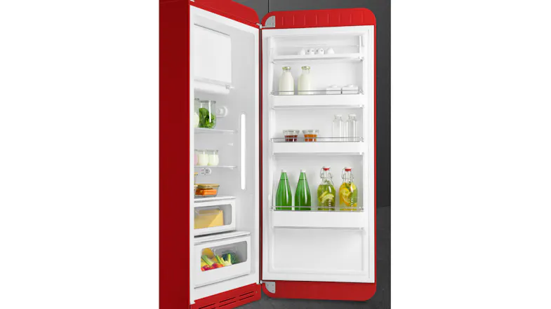 An open 50s Style Fridge Freezer fully stocked with organised milk bottles, green bottles, fresh produce, and jars An open 50s Style Fridge Freezer fully stocked with organised milk bottles, green bottles, fresh produce, and jars