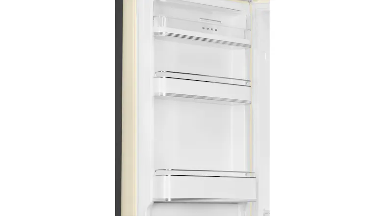 Close-up of fridge door interior with white shelves and chrome rails Close-up of fridge door interior with white shelves and chrome rails