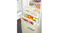 Fridge drawers filled with fruit, vegetables, and cheese, with a pie on the shelf above Fridge drawers filled with fruit, vegetables, and cheese, with a pie on the shelf above